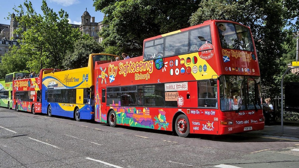 Show item 3 of 9. City Sightseeing buses