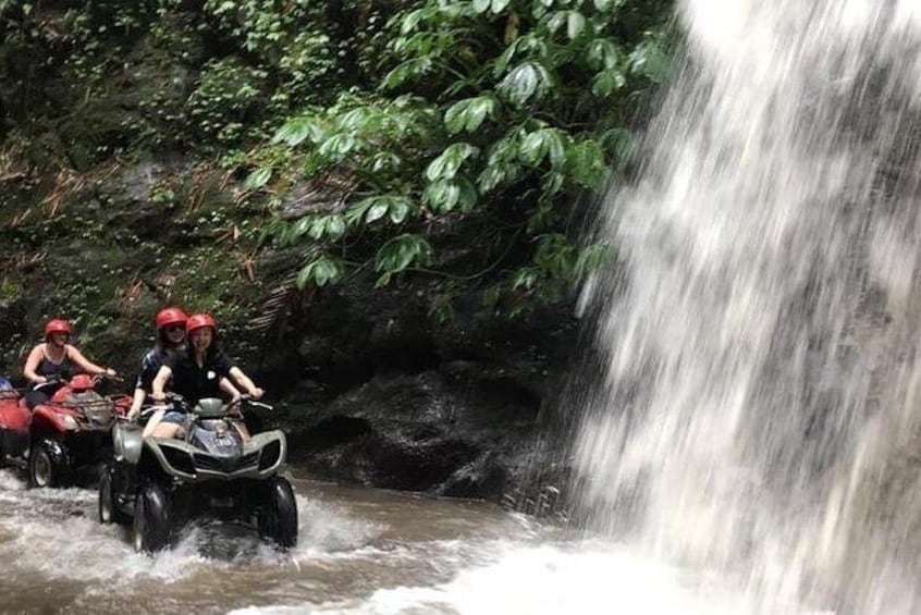 Riding through waterfall 