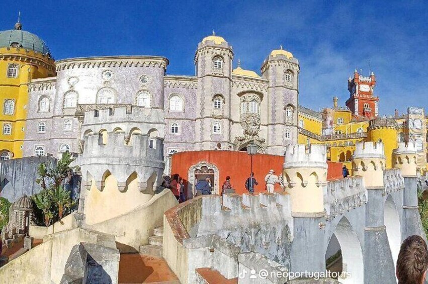 Tour to Pena Palace, Sintra, Regaleira, Guincho and Cascais 