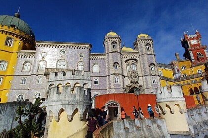 Tour to Pena Palace, Sintra, Regaleira, Guincho and Cascais