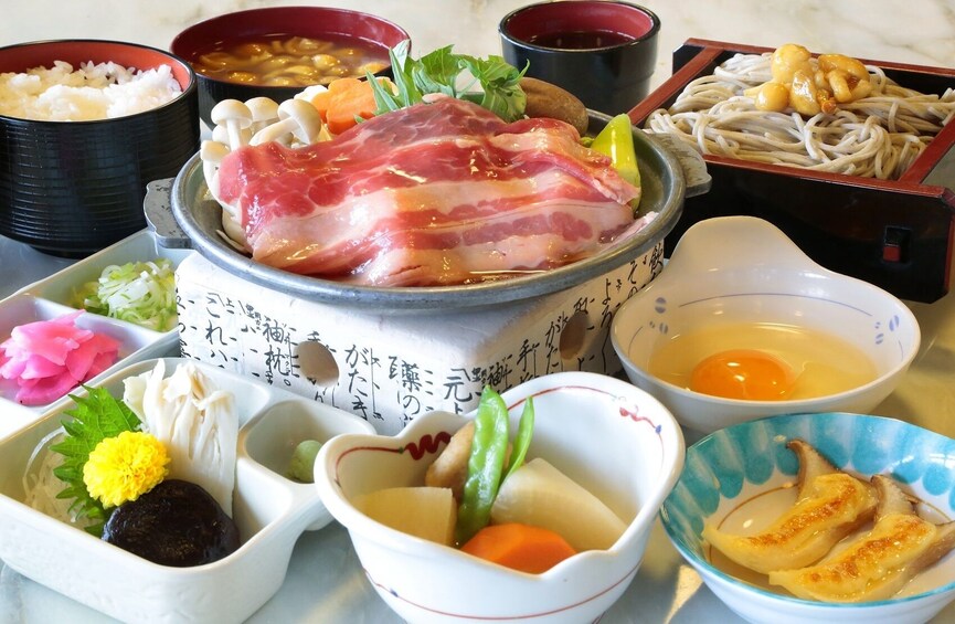 Show item 3 of 9. From Tokyo: Fukiware Falls, Fruit Picking & Ikaho Onsen Tour