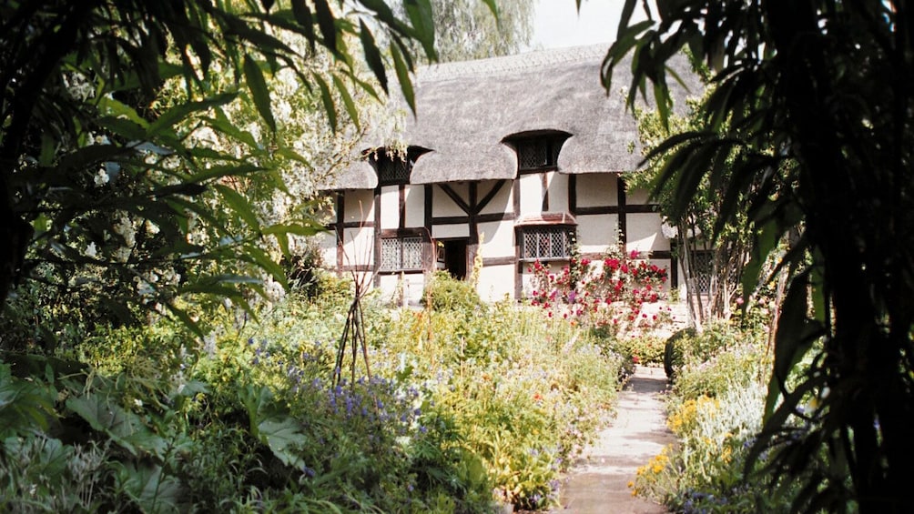 Cottage with surrounding gardens in England