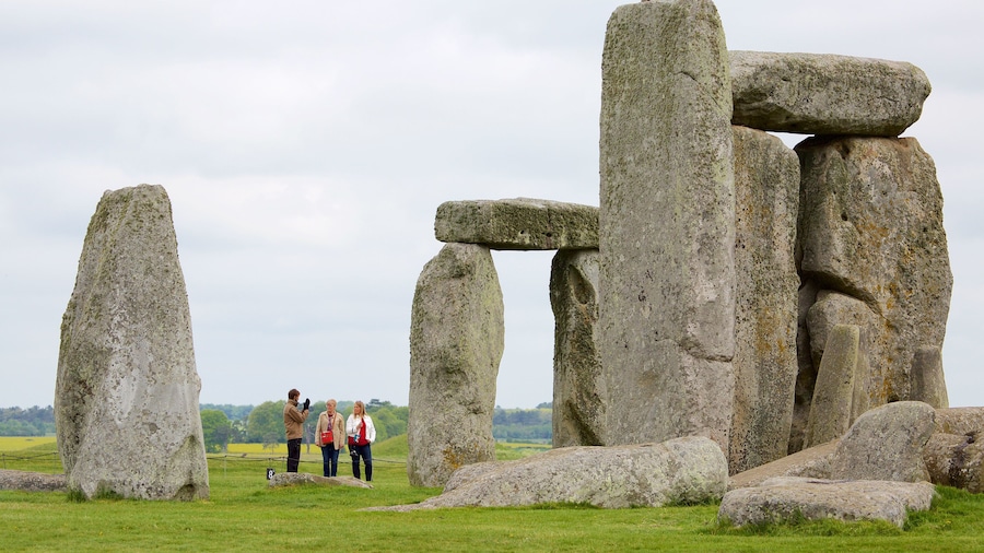 Group standing near the rocks at Stonehenge in England
