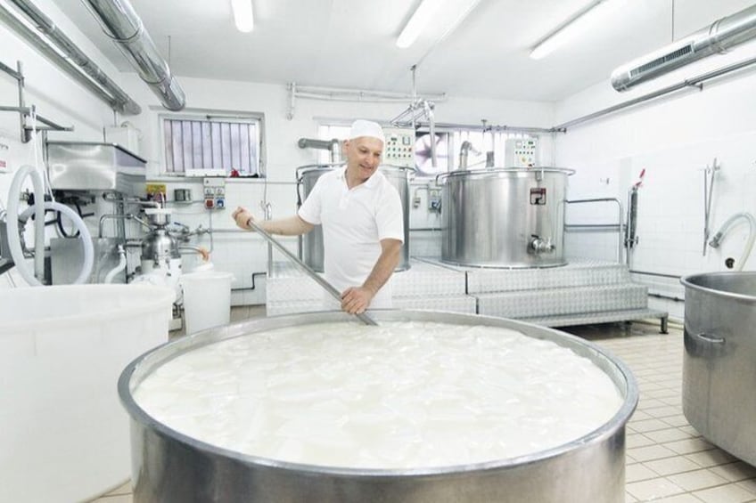 Visit an authentic Italian cheese maker dairy.