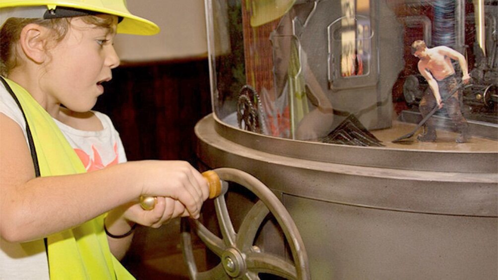 Girl learning at the Gold Discovery Centre in Waikato 