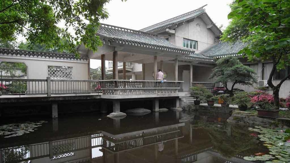 building above pond in china