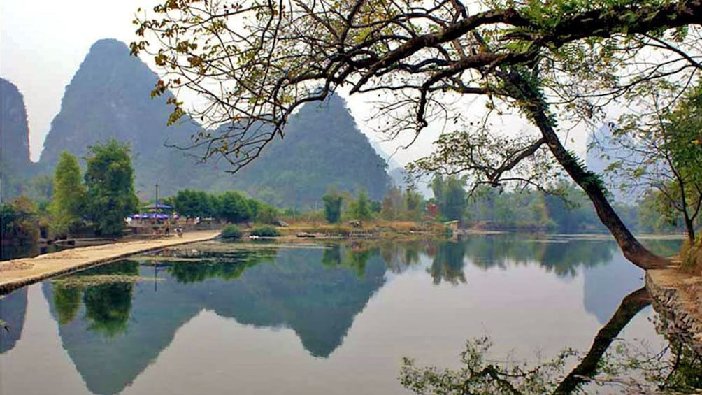 mountains reflecting off from the water in Guilin
