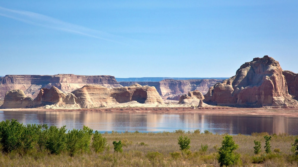 Lake Powell with cliffs and rock formations in the background in Arizona