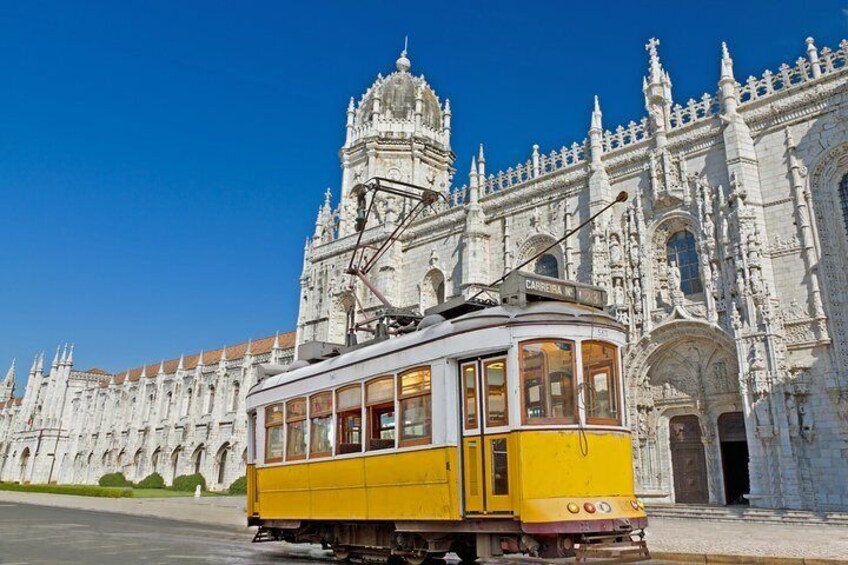 Old tram and Monastery of Jeronimos - Lisbon, Portugal
