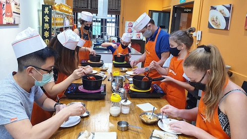 Clase práctica de cocina de Singapur e intercambio cultural