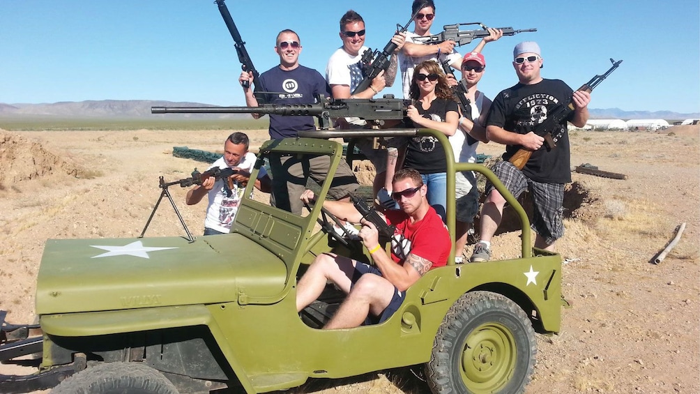 an armed group crowding on a small jeep vehicle in Las Vegas