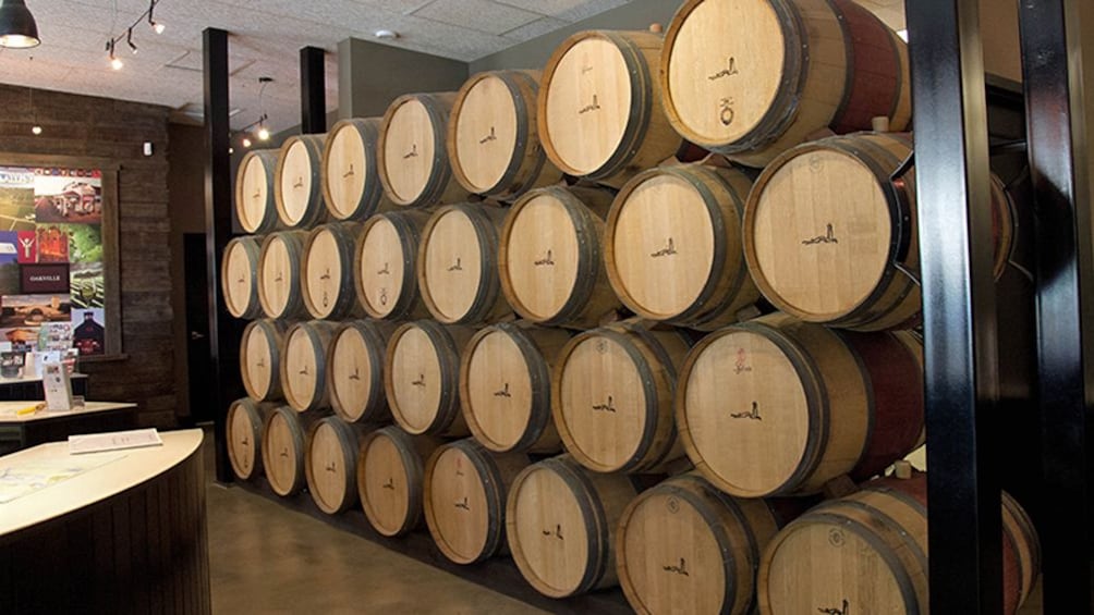 stacked wine barrels in california