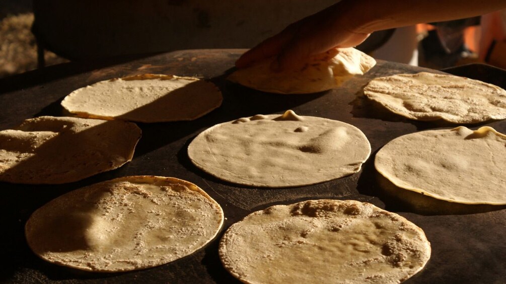 Show item 3 of 5. Tortillas being made in Houston