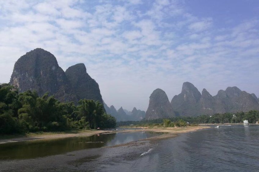 Private Day Tour in Yangshuo: Biking, Moon Hill, Xingping River Boat, and Lunch