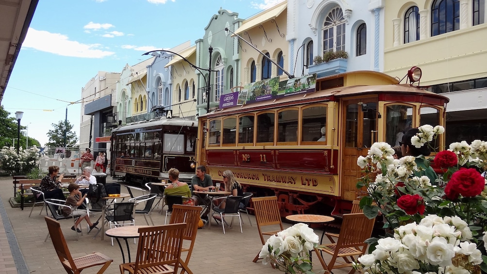 Tram parked outside cafe on New Regent Street in central Christchurch