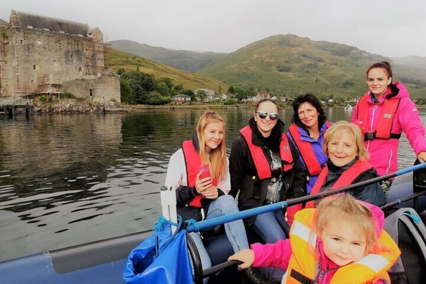 Happy family visiting Carrick castle