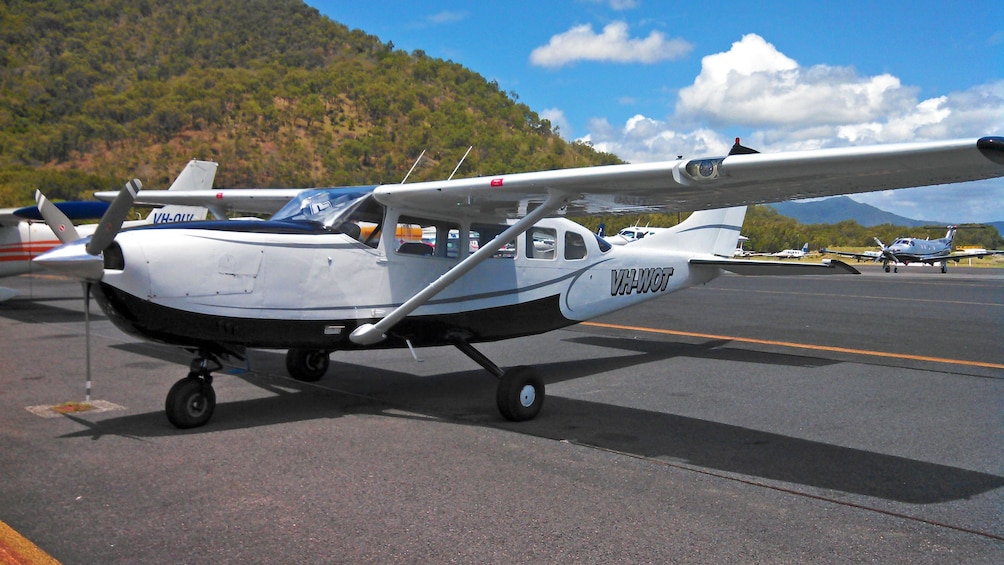Show item 2 of 4. A plane on a runway