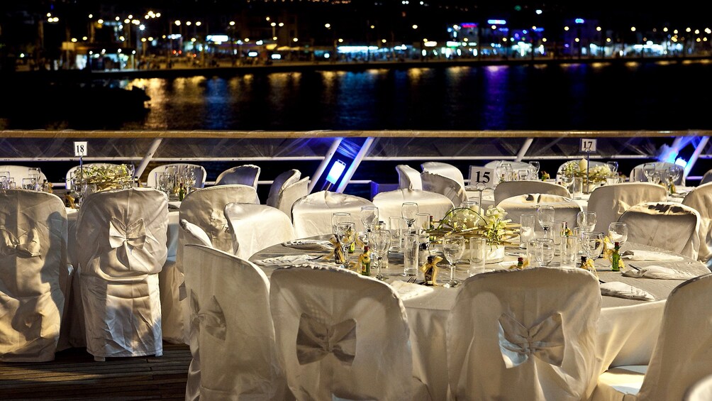 Table and chairs on Deck of WaveDancer Fireworks