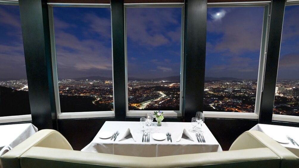Show item 4 of 5. Night view from the restaurant up on the Seoul N Tower