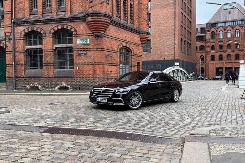 Private sightseeing tour with a luxury sedan.