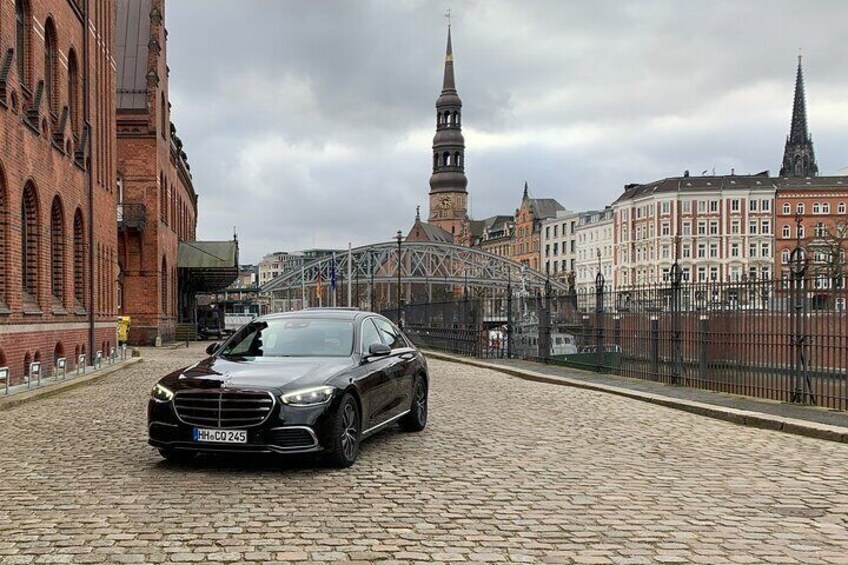 Private sightseeing tour with a luxury sedan.