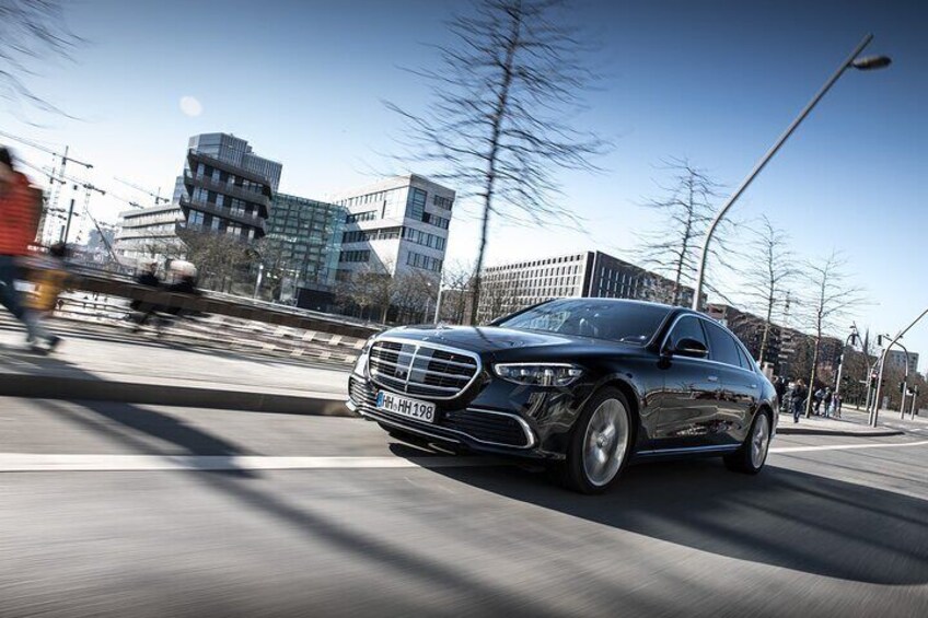 Private sightseeing tour with a luxury sedan.