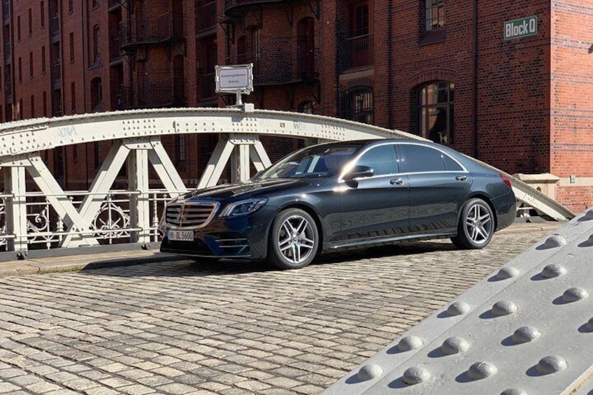 Private sightseeing tour with a luxury sedan.