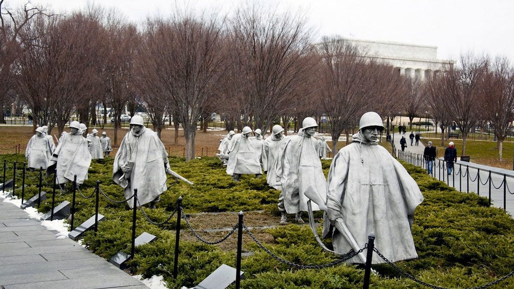 Memorial for WW2 of sculptures of Soldiers in rain gear