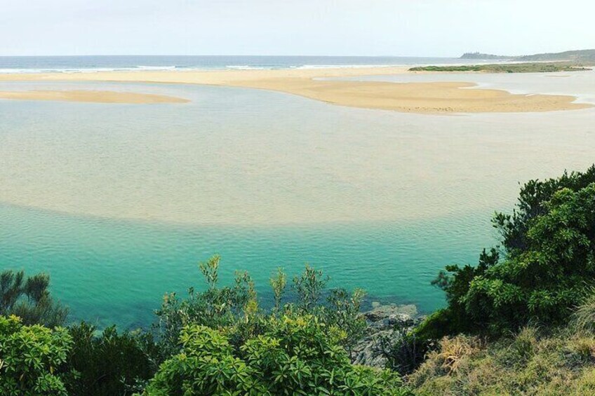 Photograph aquamarine estuaries and golden sands