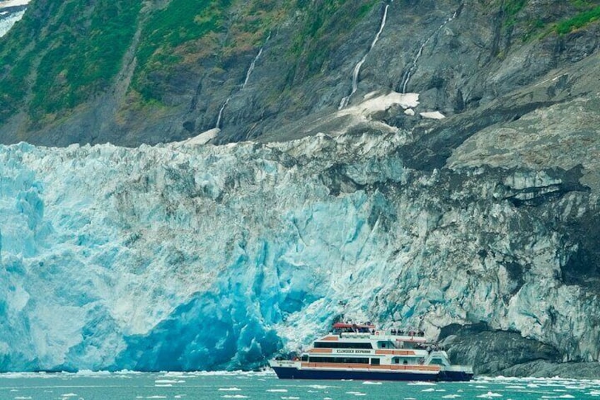 Towering mountains and valleys filled with glaciers. - Phillips Cruises & Tours, LLC