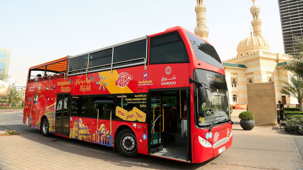 Show item 3 of 6. double decker touring bus in city of Dubai