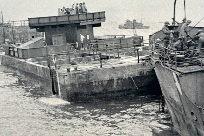 ARROMANCHES (Original pictures shot in June 1944 showing infrastructures of Artificiazl port "Muelberry A" destroyed by the storm)