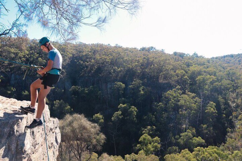 Experience the rush of Abseiling down a steep cliff face