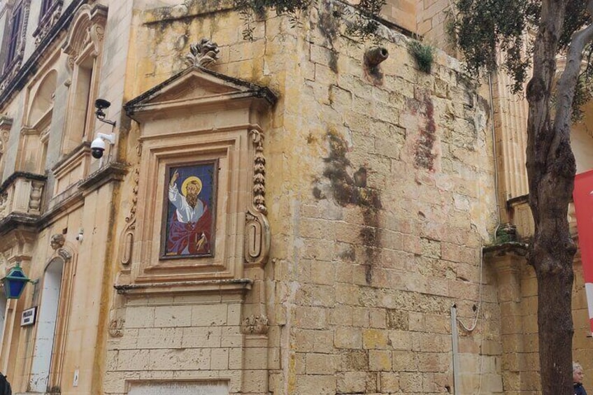 Painting of St Paul on the street walls of Mdina