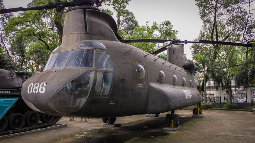 Close up of old war helicopter at naval base.