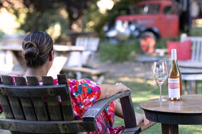 Relax outdoors with a glass of wine.