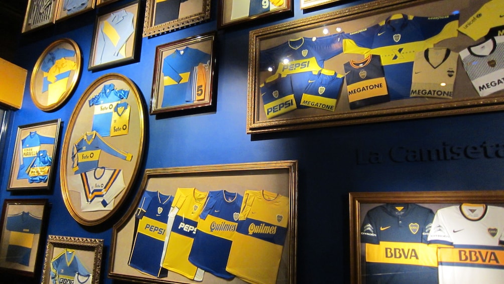 A collection of Jerseys on the wall in La Bombonera Stadium