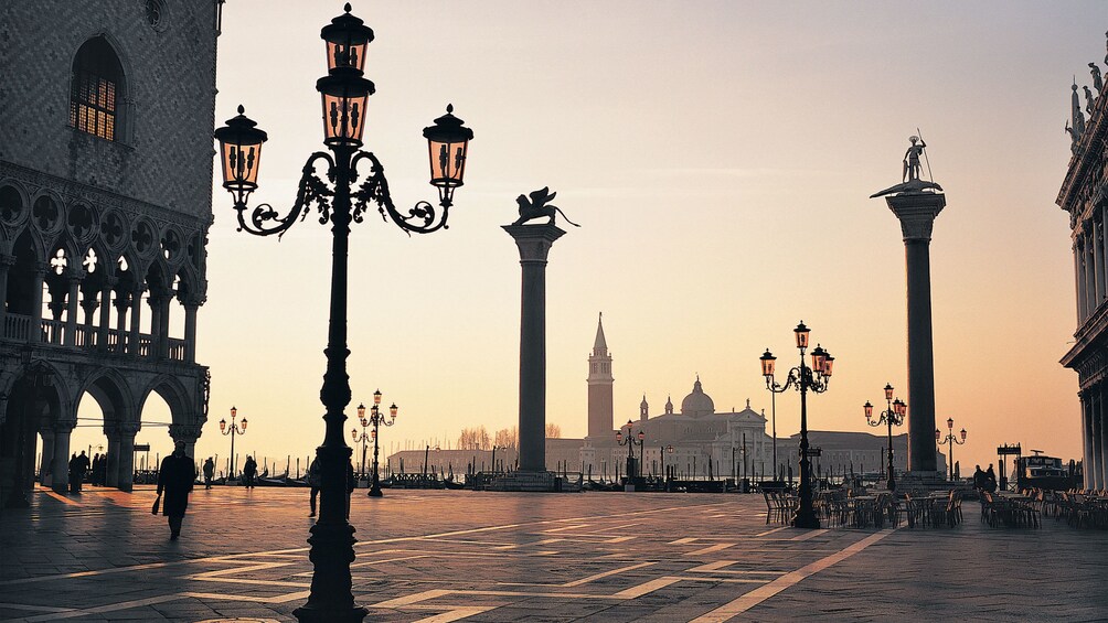 Show item 2 of 8. Beautiful courtyard in Venice at sunset.