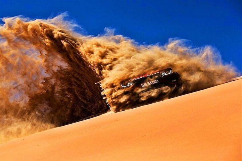 Abu Dhabi Desert Safari Dune Bashing,Came,Belly Dance & BBQ