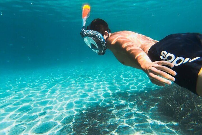  Snorkeling in the waters of cala moresca