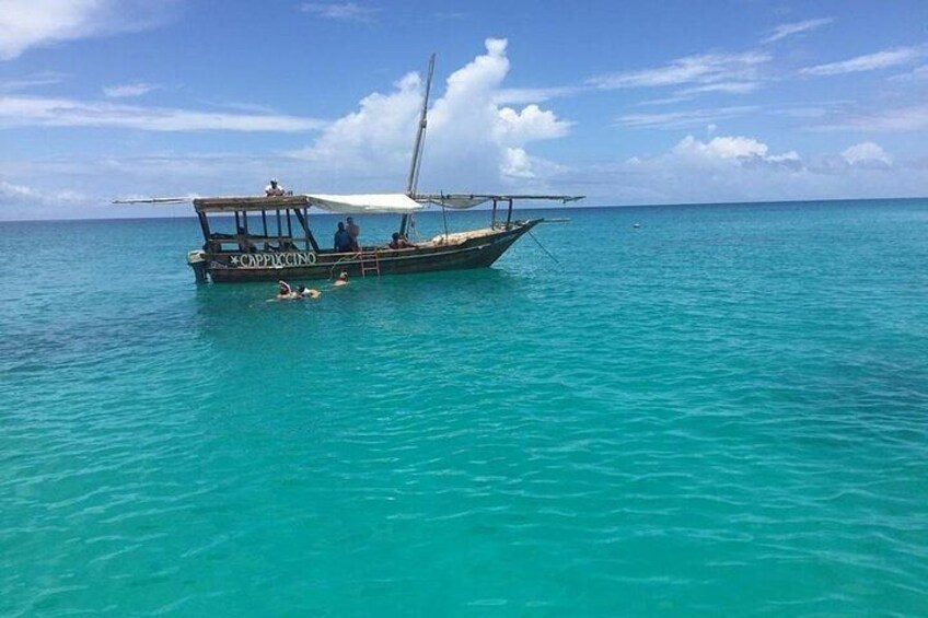 Private Dhow Cruise to Mnemba Island reef for Snorkeling | Full-day + Lunch