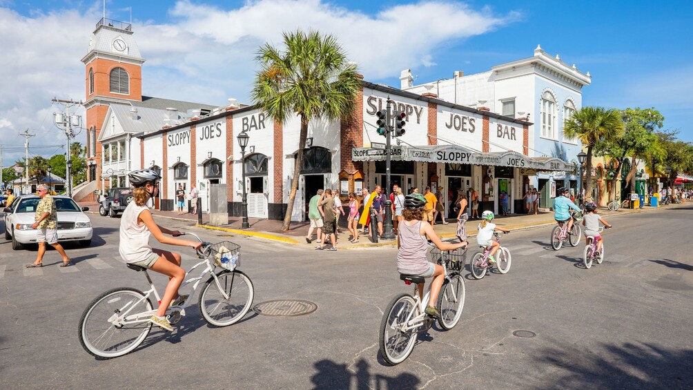 Riding bikes near a bar in Miami
