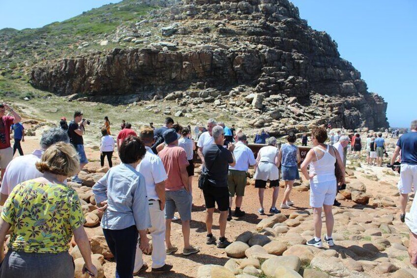 Tourists queue for photos at Cape Of Good Hope