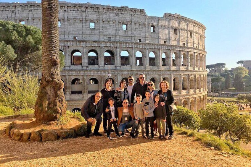 Happy guests with our guide at the Colosseum.