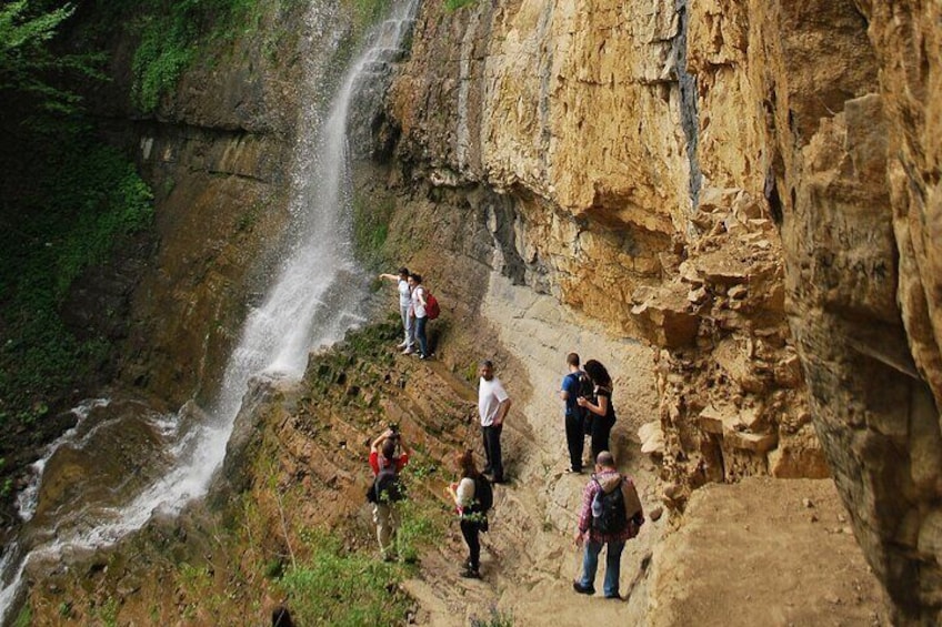 Under the mist of the waterfall