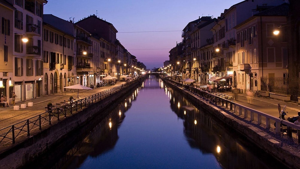 city lights along the water channel in Italy