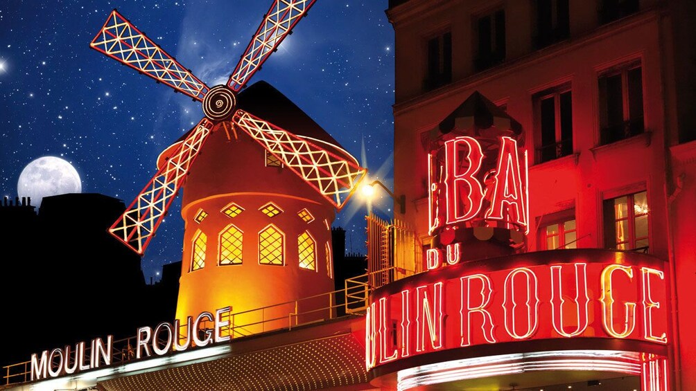 Famous windmill and sign of the Moulin Rouge in Paris