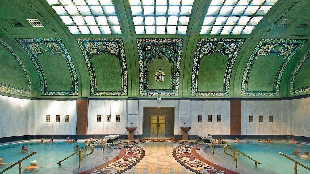 Two Budapest baths under a tile ceiling