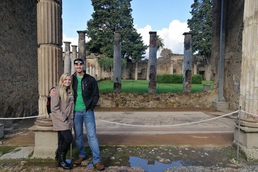 Tourists in Pompeii, house of the faun