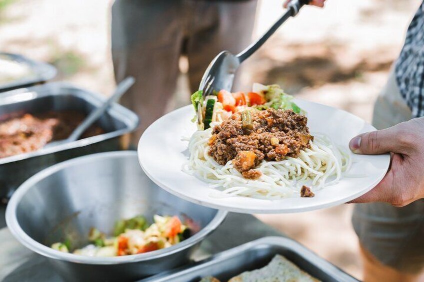 Bush tucker prepared on open fires 